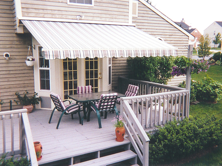 Retractable Awnings - Sunrooms | Sunspace by Deck & Shade Solutio