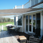 Retractable Awnings - Sunrooms | Sunspace by Deck & Shade Solutio