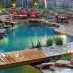 Splashy pool features turn backyards into resor