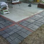 Concrete patio expanded with pavers/flagstones. http://slickdeals .