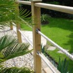 Post & rope decking boarder | Deck garden, Garden railings, Garden .