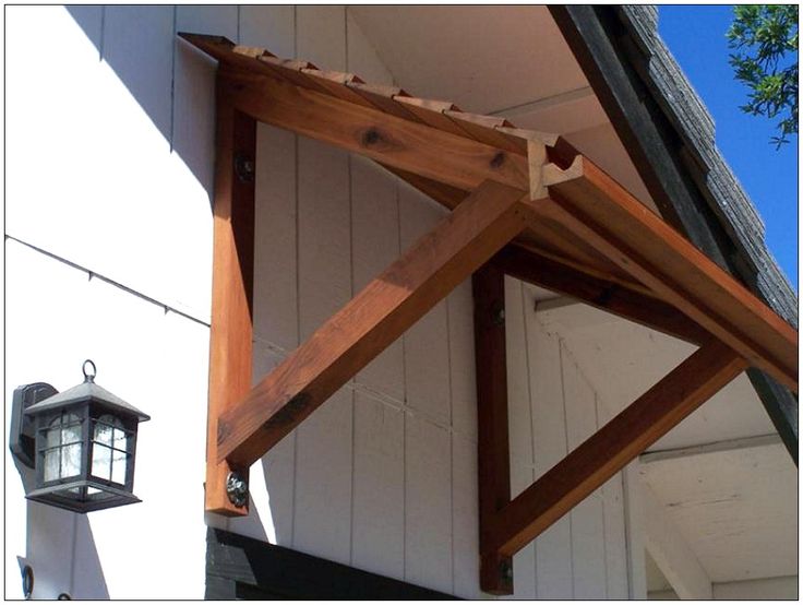 Wooden Awnings | Awning over door, Door awnings, Timber front do