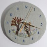 The Garden Clock - I embroidered a clock face and made a working .