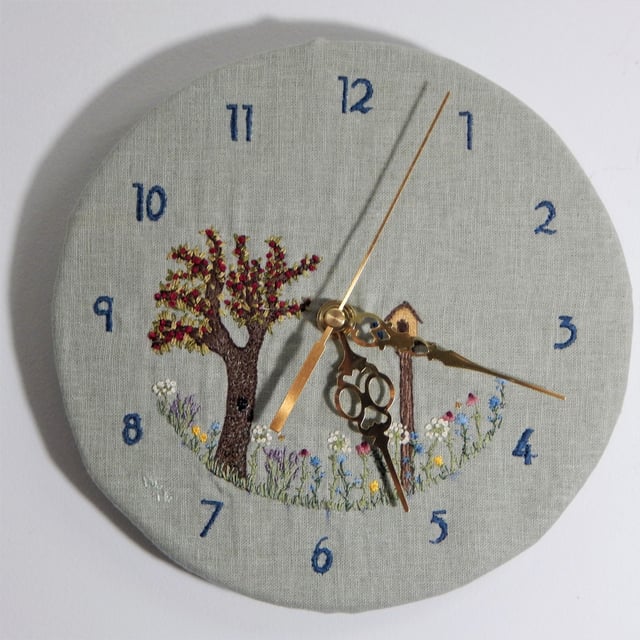 The Garden Clock - I embroidered a clock face and made a working .