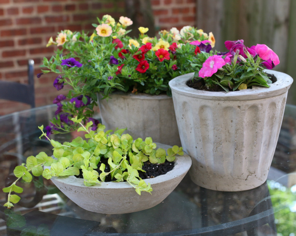 Over on eHow: DIY Cement Flower Pots | 17 Apa