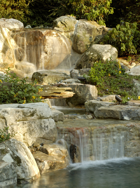 Creating a Tranquil Oasis: How to Design and Build Your Own Garden Waterfall