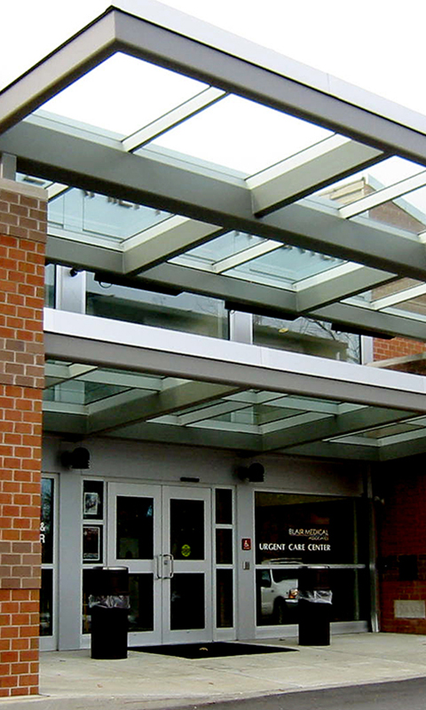 The Benefits of Glass Canopies for Commercial Buildings