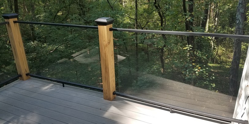 How To Clean & Maintain Outdoor Glass Railing - DecksDire