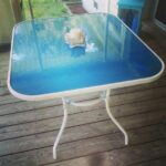 Spray paint underneath a glass top table! | Patio furniture .