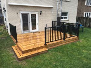 Ground level deck with aluminum railing - Fence and Deck | Small .