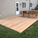 Build a deck | Building a floating deck, Ground level deck .