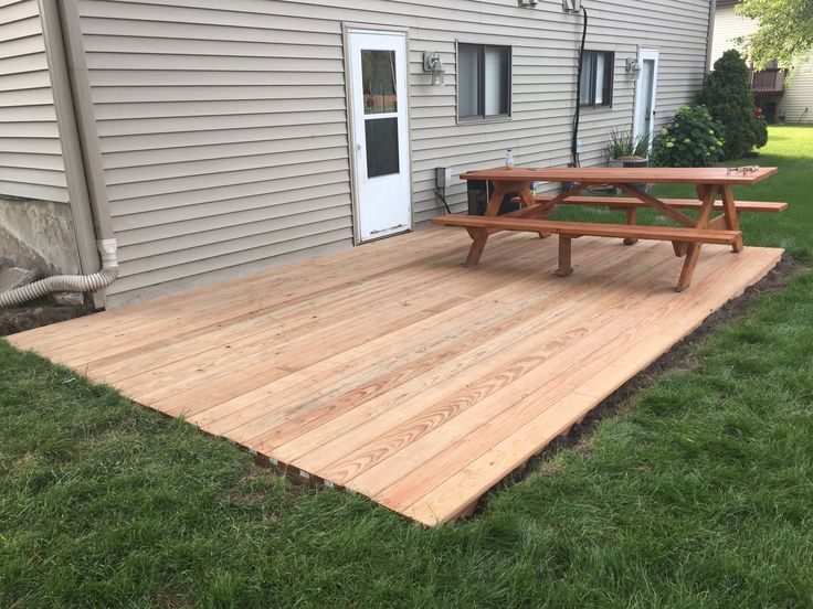 Build a deck | Building a floating deck, Ground level deck .