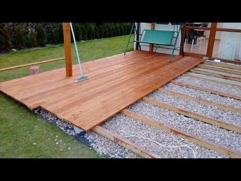 Designing and Building a Stunning Ground Level Deck in Your Backyard