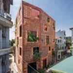 Vo Trong Nghia Architects wraps Bat Trang House in ceramic bric