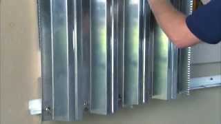 Hurricane Preparedness: Metal Storm Shutter Installation - YouTu