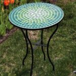 Give uniqueness to your garden with stylish mosaic garden table .