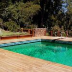 15 Impressive Designs for Wooden Pool Dec