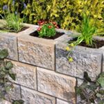 How to choose inexpensive materials for a garden wall? Cheap .